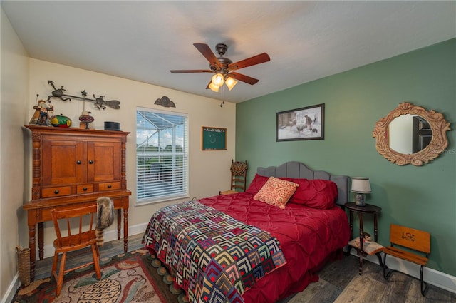 bedroom featuring ceiling fan and dark hardwood / wood-style floors