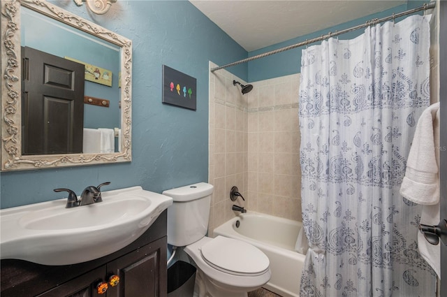 full bathroom featuring shower / bath combo, vanity, and toilet