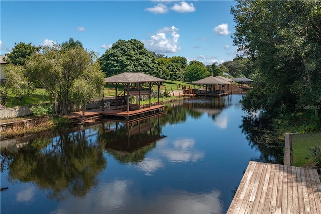 dock area featuring a water view and a gazebo