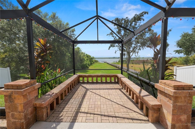 view of patio / terrace featuring a water view