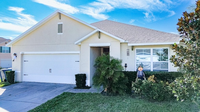 ranch-style home featuring a garage