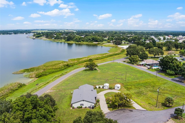 drone / aerial view with a water view