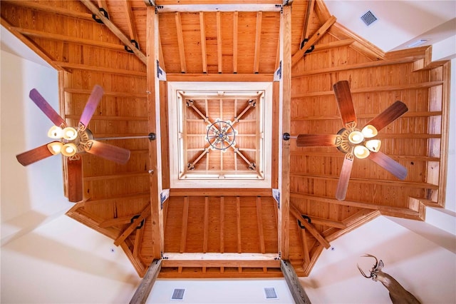 interior space with lofted ceiling and ceiling fan