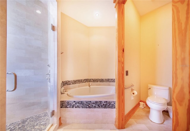 bathroom featuring plus walk in shower, tile patterned floors, and toilet