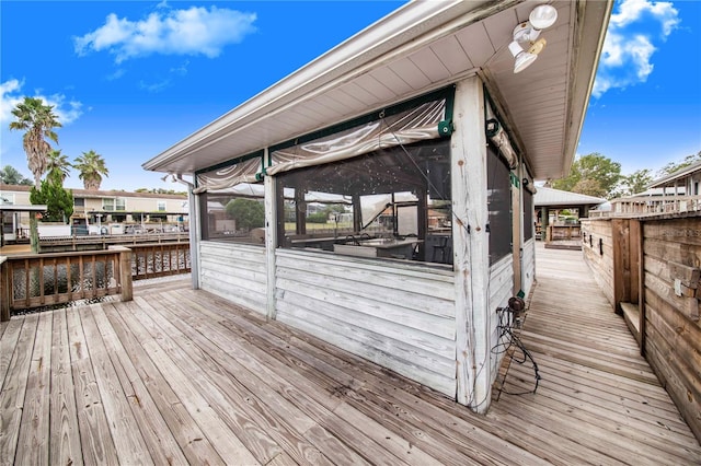 wooden terrace with a water view