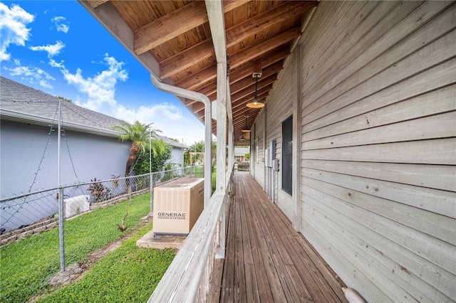 wooden deck with a yard