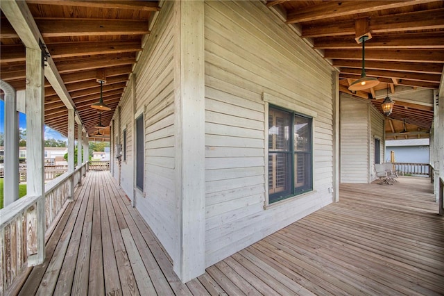 wooden terrace with a porch