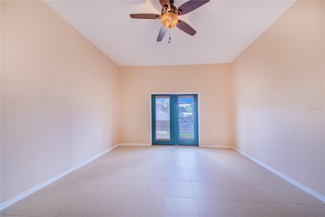 unfurnished room with light tile patterned floors and ceiling fan