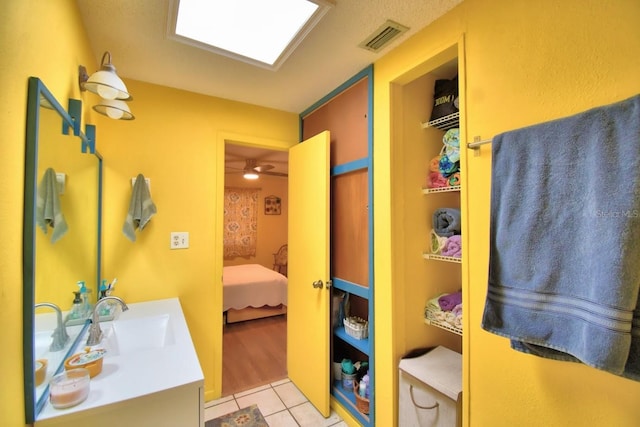 bathroom featuring vanity and tile patterned floors