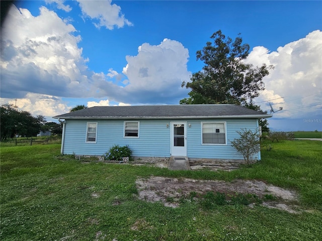 exterior space featuring a front lawn