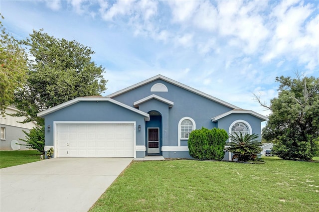 single story home featuring a garage and a front lawn