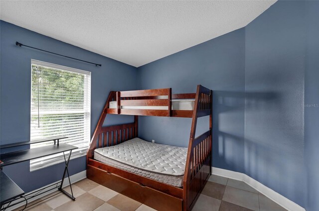 bedroom with a textured ceiling