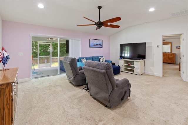 living room featuring light carpet and lofted ceiling