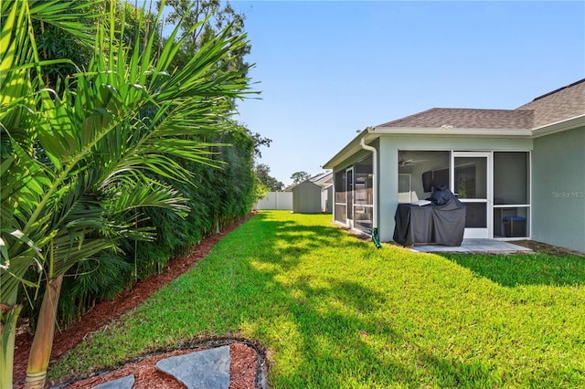 view of yard featuring a sunroom