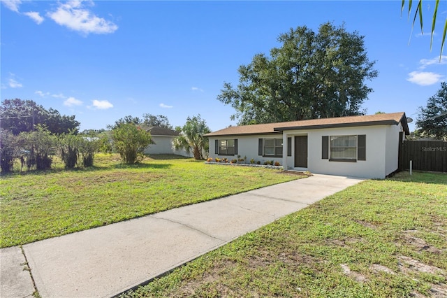 ranch-style house with a front yard