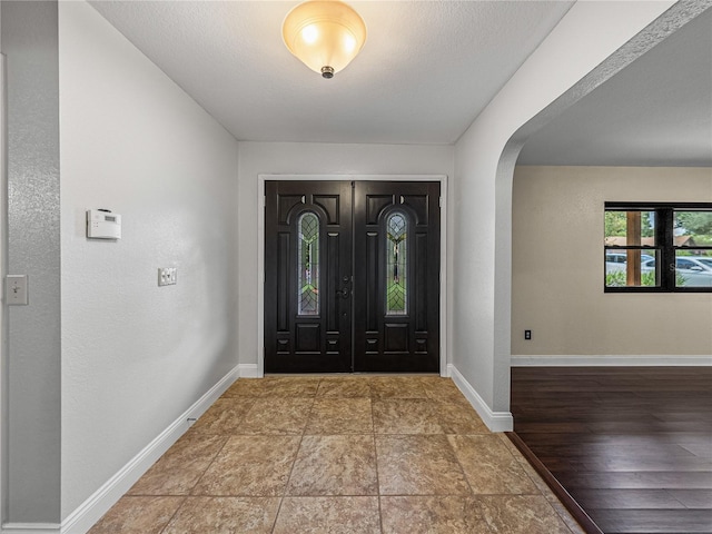 entryway with wood-type flooring