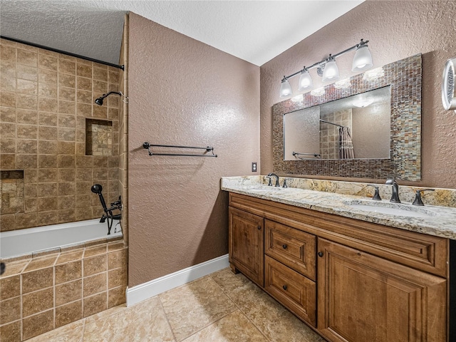 bathroom with shower / bathtub combination with curtain, tile patterned flooring, a textured ceiling, and vanity