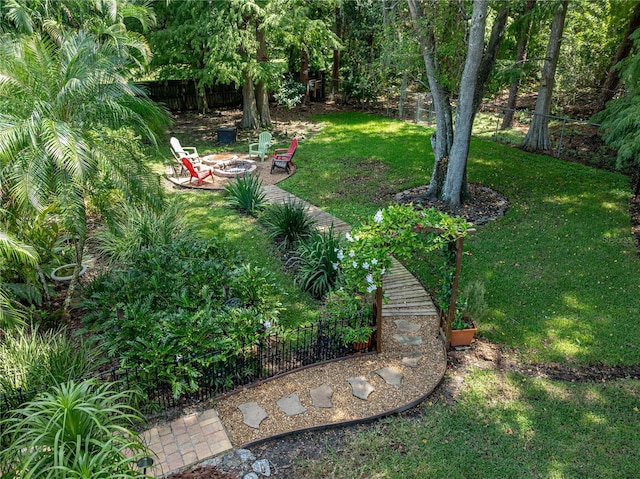 view of yard with an outdoor fire pit