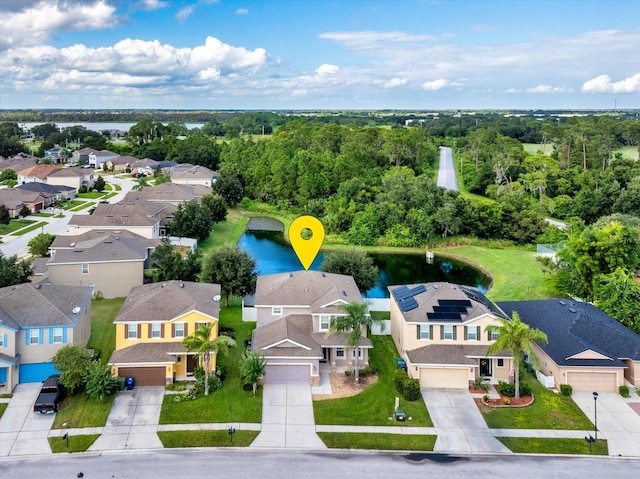 drone / aerial view with a water view