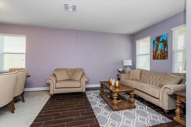 living room with dark wood-type flooring