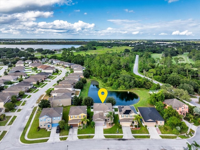 bird's eye view with a water view