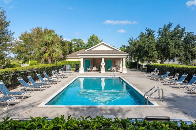 view of pool with a patio area