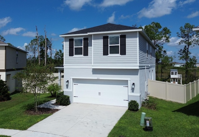 view of front of house featuring a garage and a front yard