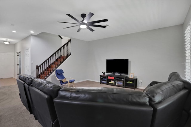 living room featuring ceiling fan and light carpet