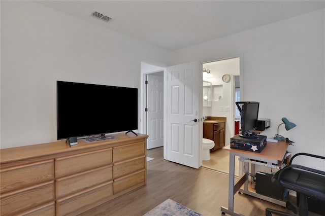 office with wood-type flooring