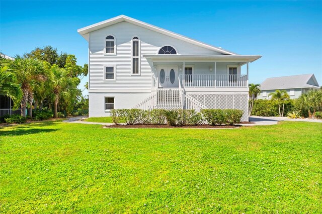 view of front of home with a front lawn