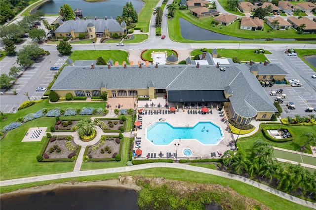 birds eye view of property featuring a water view