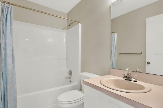 full bathroom featuring vanity, toilet, and shower / bath combination with curtain