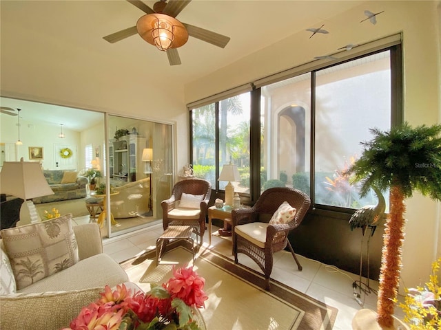 sunroom with vaulted ceiling and ceiling fan