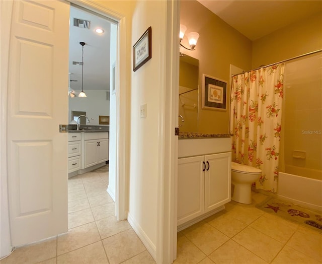 full bathroom with toilet, vanity, tile patterned floors, and shower / bathtub combination with curtain