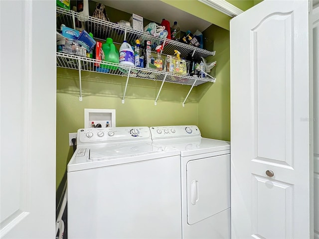 laundry room with washer and dryer