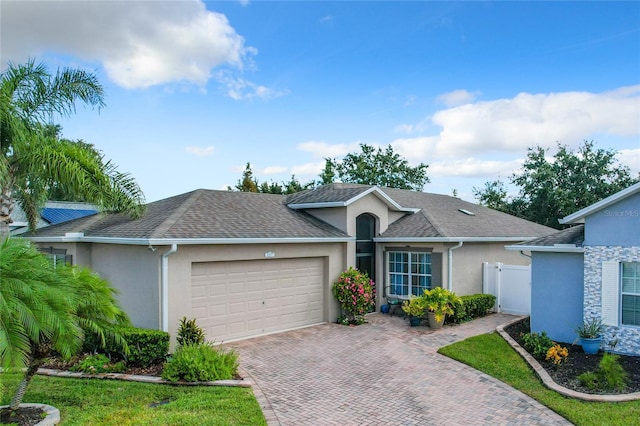 ranch-style house with a garage