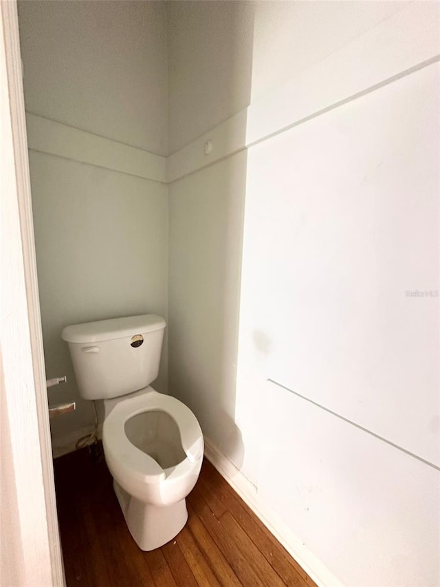 121 Bates Ave SE, Winter Haven, FL 33880 - bathroom with wood-type flooring and toilet