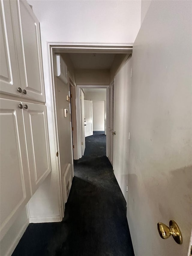 121 Bates Ave SE, Winter Haven, FL 33880 - hall with dark carpet