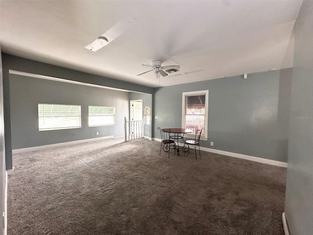 121 Bates Ave SE, Winter Haven, FL 33880 - carpeted spare room with a healthy amount of sunlight and ceiling fan