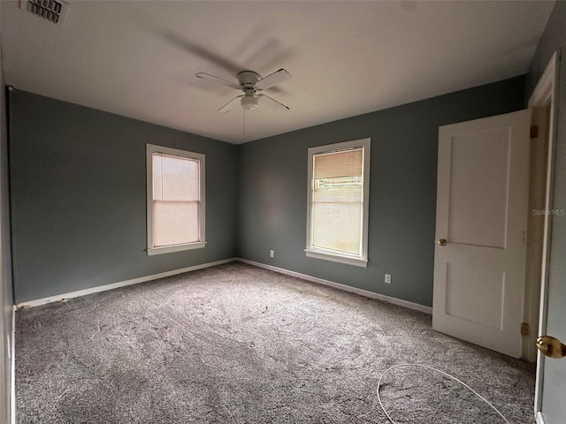 121 Bates Ave SE, Winter Haven, FL 33880 - carpeted spare room featuring ceiling fan