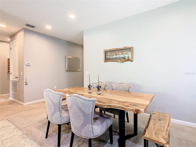 278 Alford Dr, Davenport, FL 33896 - dining room featuring light carpet, baseboards, and recessed lighting