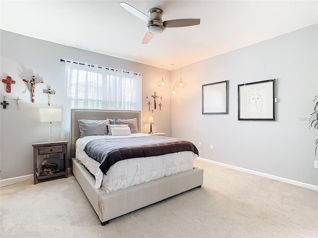 278 Alford Dr, Davenport, FL 33896 - bedroom featuring light colored carpet, baseboards, and a ceiling fan