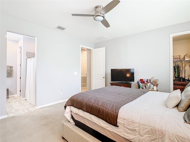 278 Alford Dr, Davenport, FL 33896 - bedroom featuring a walk in closet, baseboards, ceiling fan, a closet, and light carpet