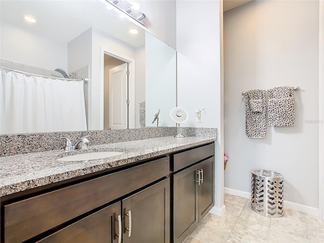 278 Alford Dr, Davenport, FL 33896 - full bath featuring baseboards, vanity, and a shower with curtain