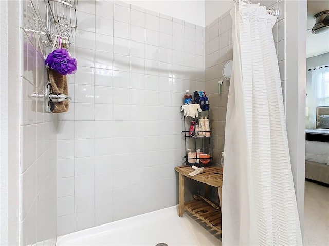 bathroom featuring curtained shower