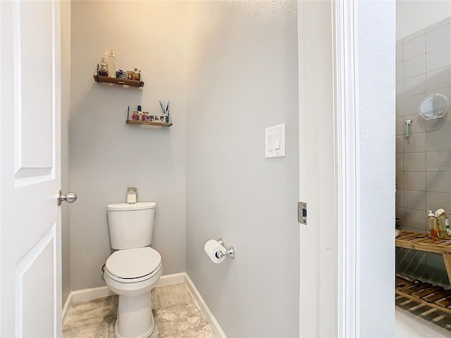 bathroom featuring toilet