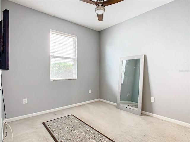 278 Alford Dr, Davenport, FL 33896 - empty room featuring carpet flooring, ceiling fan, and baseboards