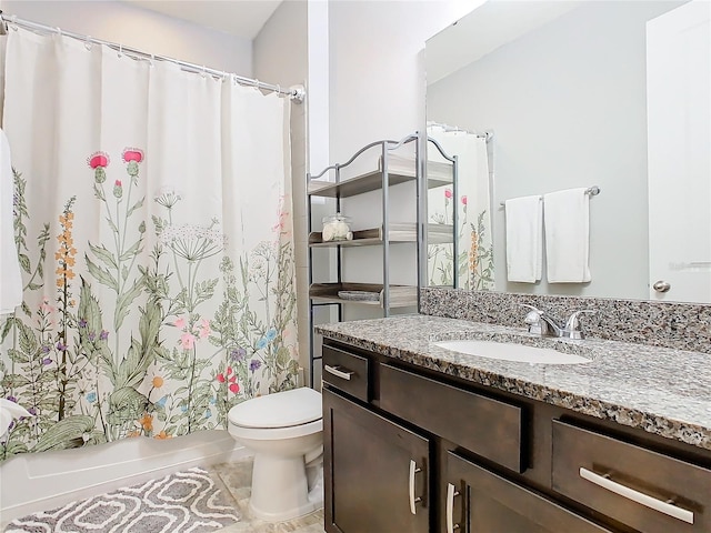 full bathroom with shower / bath combo, vanity, toilet, and tile patterned floors