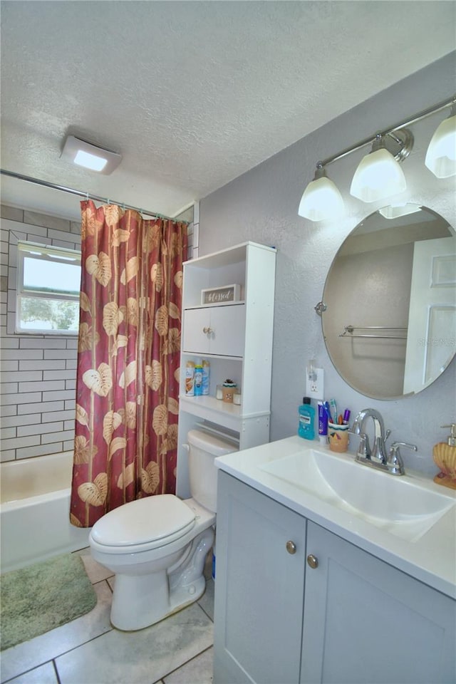 full bathroom featuring shower / bathtub combination with curtain, vanity, a textured ceiling, toilet, and tile patterned floors