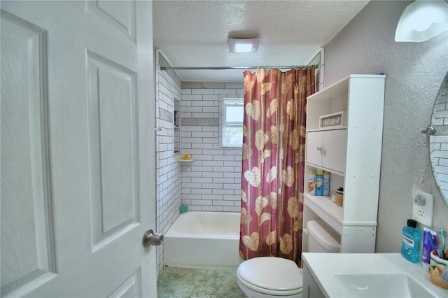 full bathroom featuring shower / tub combo with curtain, a textured ceiling, vanity, and toilet